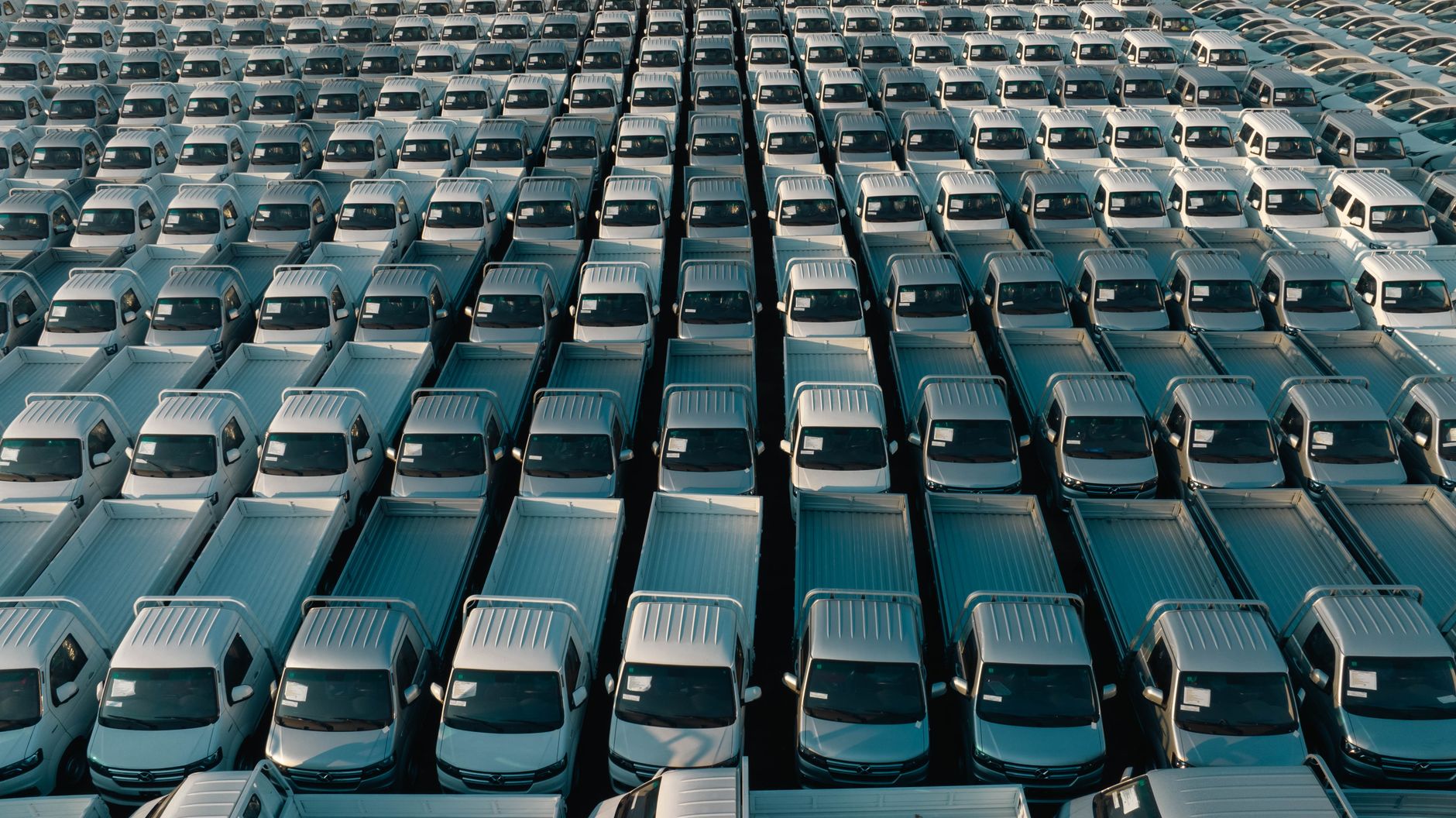 Fleet of vehicles parked in rows