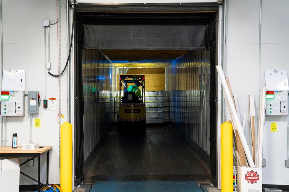Forklift loading goods in a warehouse
